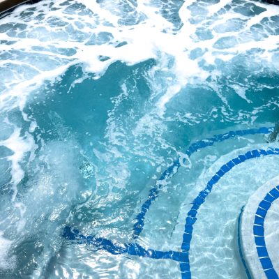 Overhead,View,Of,A,Hot,Tub,With,Swirling,Foamy,Water